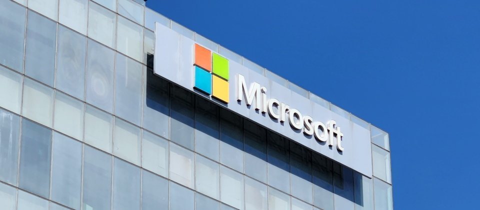 Photo by <a href="https://unsplash.com/@torres_sinh?utm_content=creditCopyText&utm_medium=referral&utm_source=unsplash">Sam Torres</a> on <a href="https://unsplash.com/photos/a-building-with-a-microsoft-sign-on-the-side-of-it-7j-PBAMqAtI?utm_content=creditCopyText&utm_medium=referral&utm_source=unsplash">Unsplash</a>