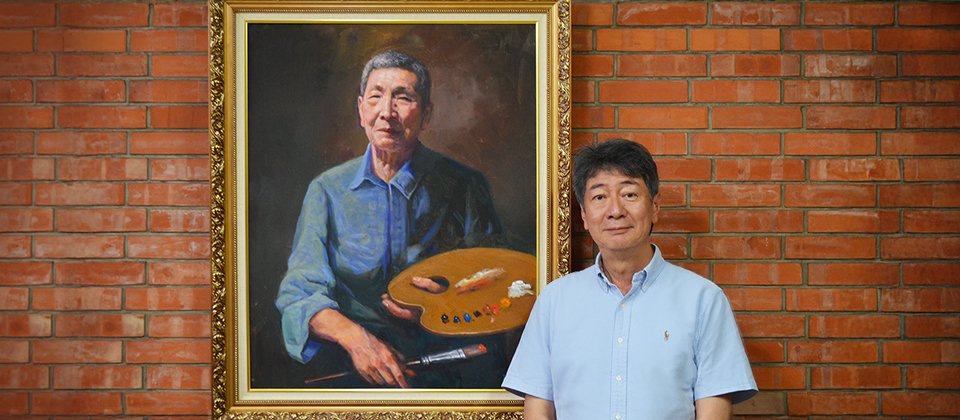 福住建設創辦人簡德耀(畫像)、總經理簡學禮(右) 。圖片提供 / 台灣碩軟