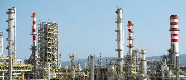 Photo by <a href="https://unsplash.com/@c7arb?utm_source=unsplash&utm_medium=referral&utm_content=creditCopyText">Christian Harb</a> on <a href="https://unsplash.com/photos/a-factory-with-a-lot-of-red-and-white-pipes-76yzygeNLT0?utm_source=unsplash&utm_medium=referral&utm_content=creditCopyText">Unsplash</a>